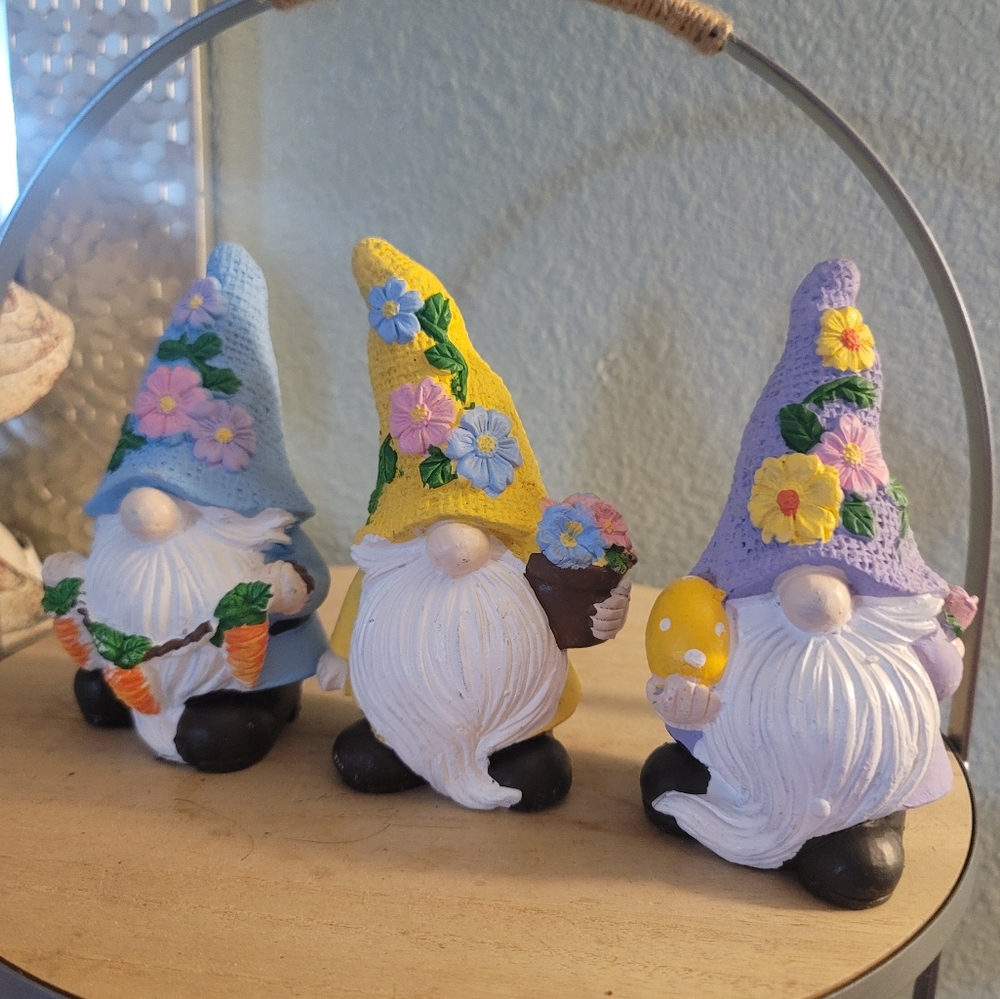 Easter garden gnomes, blue, yellow and purple.